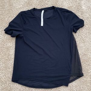 Lululemon workout top with mesh side. Size 8